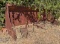 Rust-Colored Steel Loader Bucket