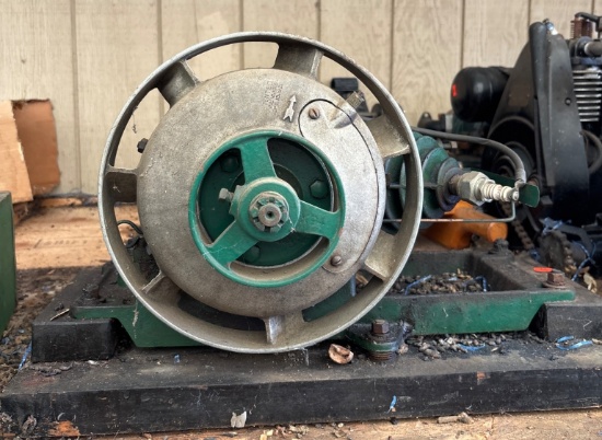 Cast Iron and Steel Belt-Driven Machine Component on Wooden Base