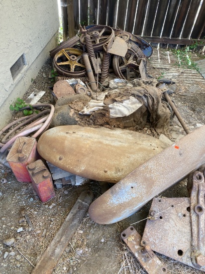 Tractor and Crawler Parts Including Wheels, Springs, and Panels