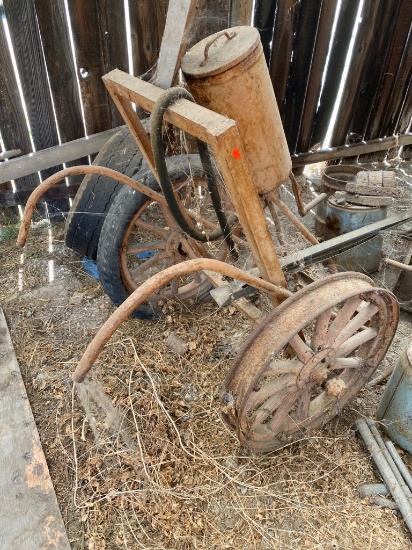 Metal Wheeled Cart with Cylindrical Reservoir and Frame