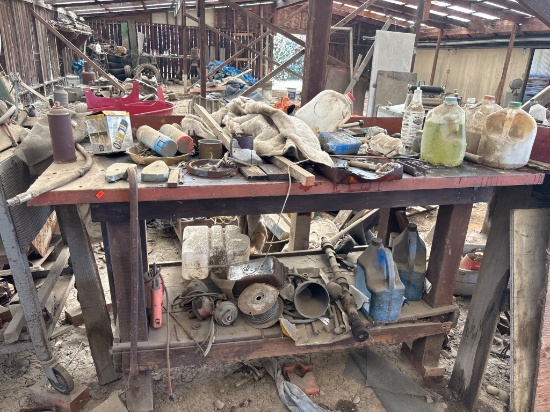 Metal Workbench with Assorted Tools, Hardware, and Containers