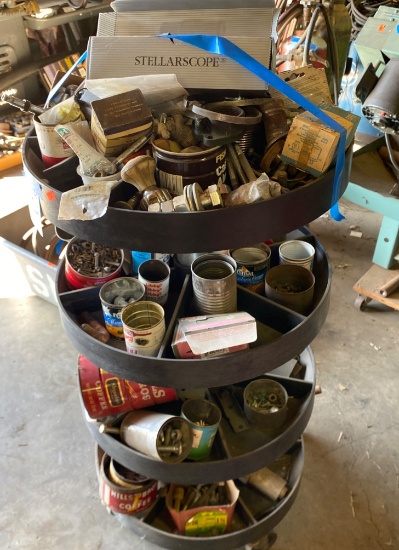 Four-Tier Metal Rotating Storage Rack with Assorted Hardware and Components