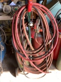 Oxy-Acetylene Torch Set with Hoses, Regulators, and Cylinders on Wheeled Cart