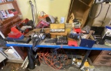 Contents of Workbench Including Tools, Equipment, and Accessories