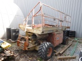 Wrecked JLG 25RTS 4x4x2 Scissors LIft Wrecked. AS-IS. Gas Engine.