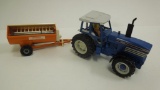 TW- 35 Ford Tractor and Howard Rotospreader 155