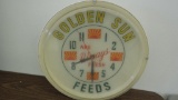 Golden Sun Feeds Lighted Clock