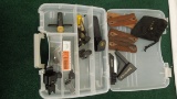 Box of assorted firearm parts