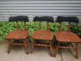 3 wood chairs with vinyl backs