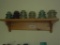 Wood shelf with 6 glass insulators
