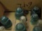 Box of glass insulators and 3 vintage phones