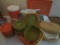 Tupperware, strainers, steamer, cutting board, flour canister