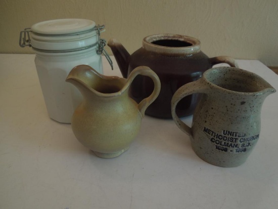 McCoy pottery, small "Frank" creamer, small pitcher, and white canister