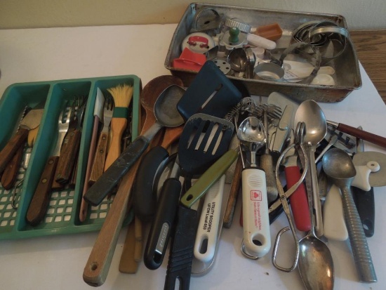 Assorted Kitchen Utensils, cake pan, cookie cutters, green organizing tray