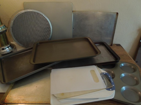 Cookie sheets, pizza pans, plastic cutting boards