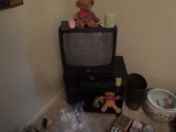 TV stand and TV, VCR, bears and candles