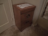 Small side table with drawers, wall mirror, shelf and alarm clock