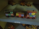 Wood train with block letters, wind up race car, log truck, large car and small car, van