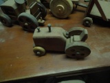 2 small wood tractors, 1 large wood tractor with trailer