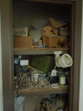 Contents of small closet, wood working tools, wood parts, ext.cords