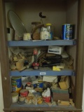 Contents of closet with drawer, tricycle, cordless drill, wood working supplies