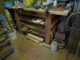 Work bench and wood underneath, includes two vises (not contents on top)