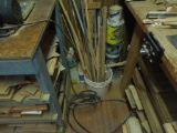 Bucket of wood parts, gallons of stain/ paint, eclectic cord