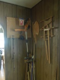 Contents in corner and on peg board, weed whip, small wood stove