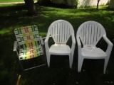 3 Lawn chairs, (2 white stack-able and 1 folding)
