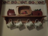 Apple wall decor, apple basket, mugs, wooden shelf
