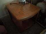 Wooden end table, and wicker upholstered chair