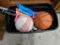 Tote of kids sporting equipment Basketballs and more