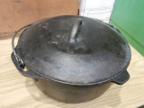 Cast iron Dutch oven and wooden box
