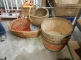 Wicker clothes basket, metal egg basket, and bushel baskets