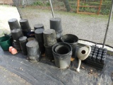 Assorted plant pots and hand sprinklers