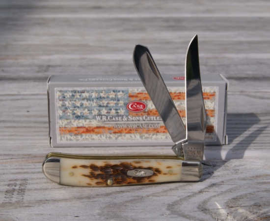 CASE XX AMBER BONE PEACH SEED MINI TRAPPER KNIFE NEW IN BOX