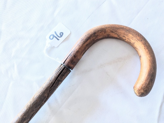 ANTIQUE CARVED WOODEN CANE (MARKED MADE IN WI)