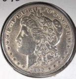 1890 MORGAN SILVER DOLLAR, AU