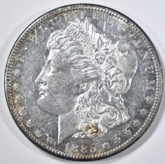 1885-S MORGAN DOLLAR AU/BU LIGHT SCRATCH OBV.