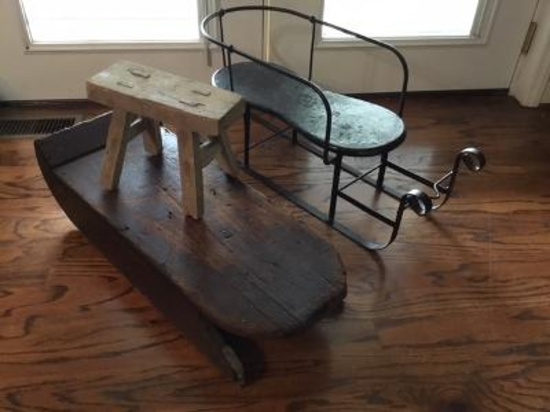 2 old sleds and stool