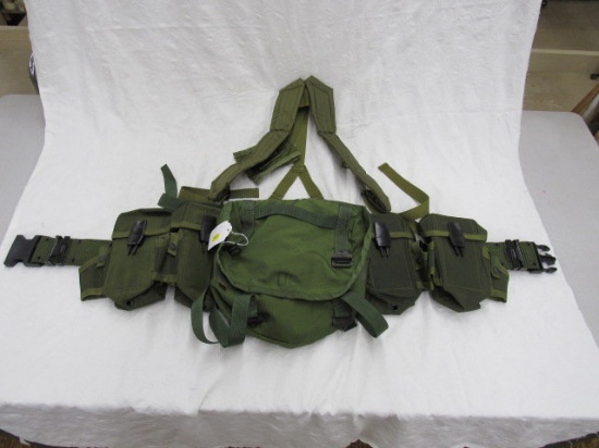 Military style green equipment harness with 4 magazine pouches and