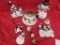 7 assorted snowmen candle toppers.