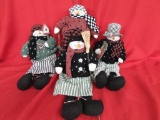 4 plush dressed snowmen