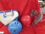 2 bowling balls with bags.
