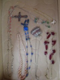 7 Necklaces; beads, silver and gold 1 silver gem cross