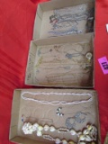 3 boxes of assorted Jewelry.