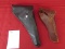 2 leather revolver holster. one marked moose brand, F15s