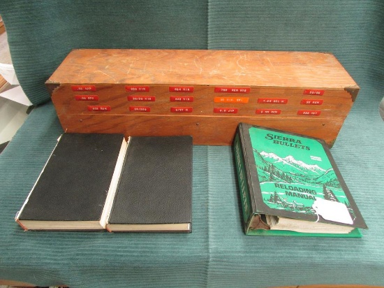 3 reloading books and wooden reloading die organizer.