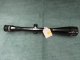 Tasco TS 24x44 scope with caps, previously mounted