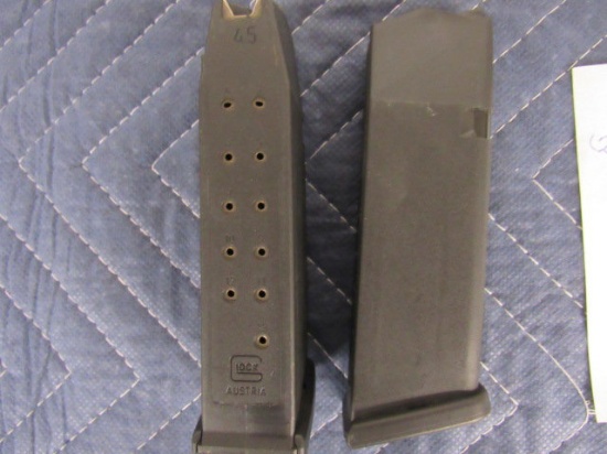 2x 45 cal glock mags. 13rds. times the money.